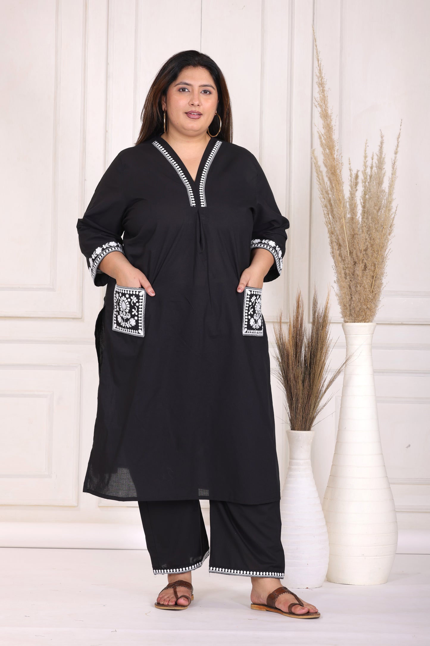 SOLID EMBROIDERED COTTON KURTA PANT SET IN BLACK WITH PINK BIRD MOTIFS BY PLUSSIZEKURTI