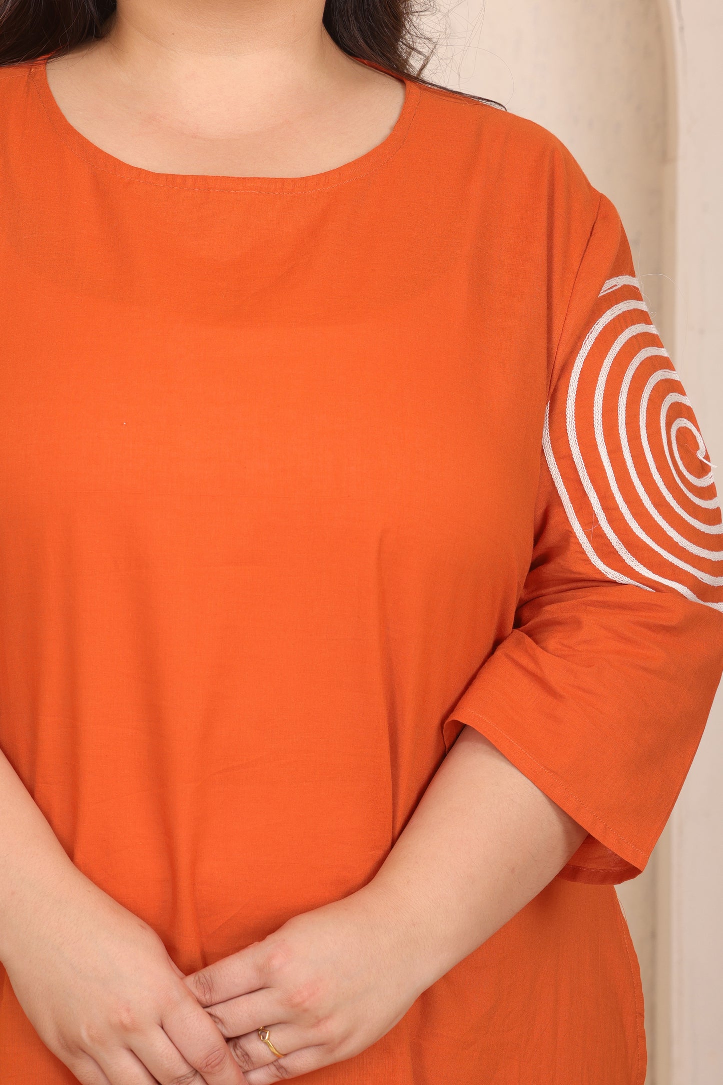 SOLID SPIRAL EMBROIDERY COTTON A-LINE DRESS IN ORANGE BY PLUSSIZEKURTI