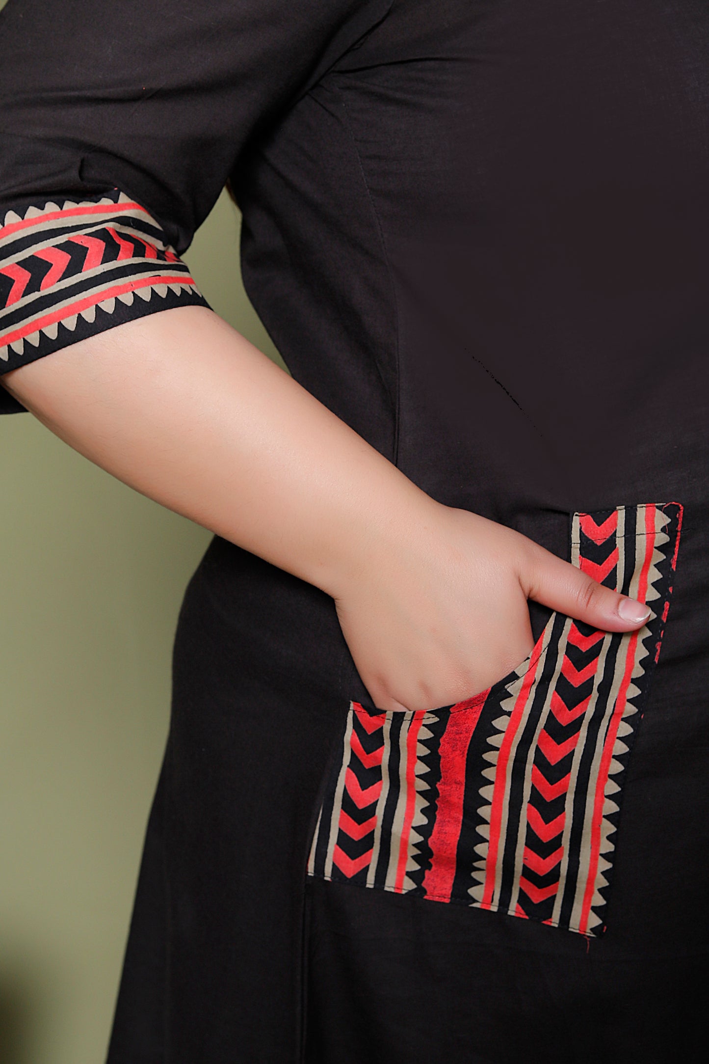 SOLID POCKET PRINT COTTON KURTI IN BLACK BY PLUSSIZEKURTI