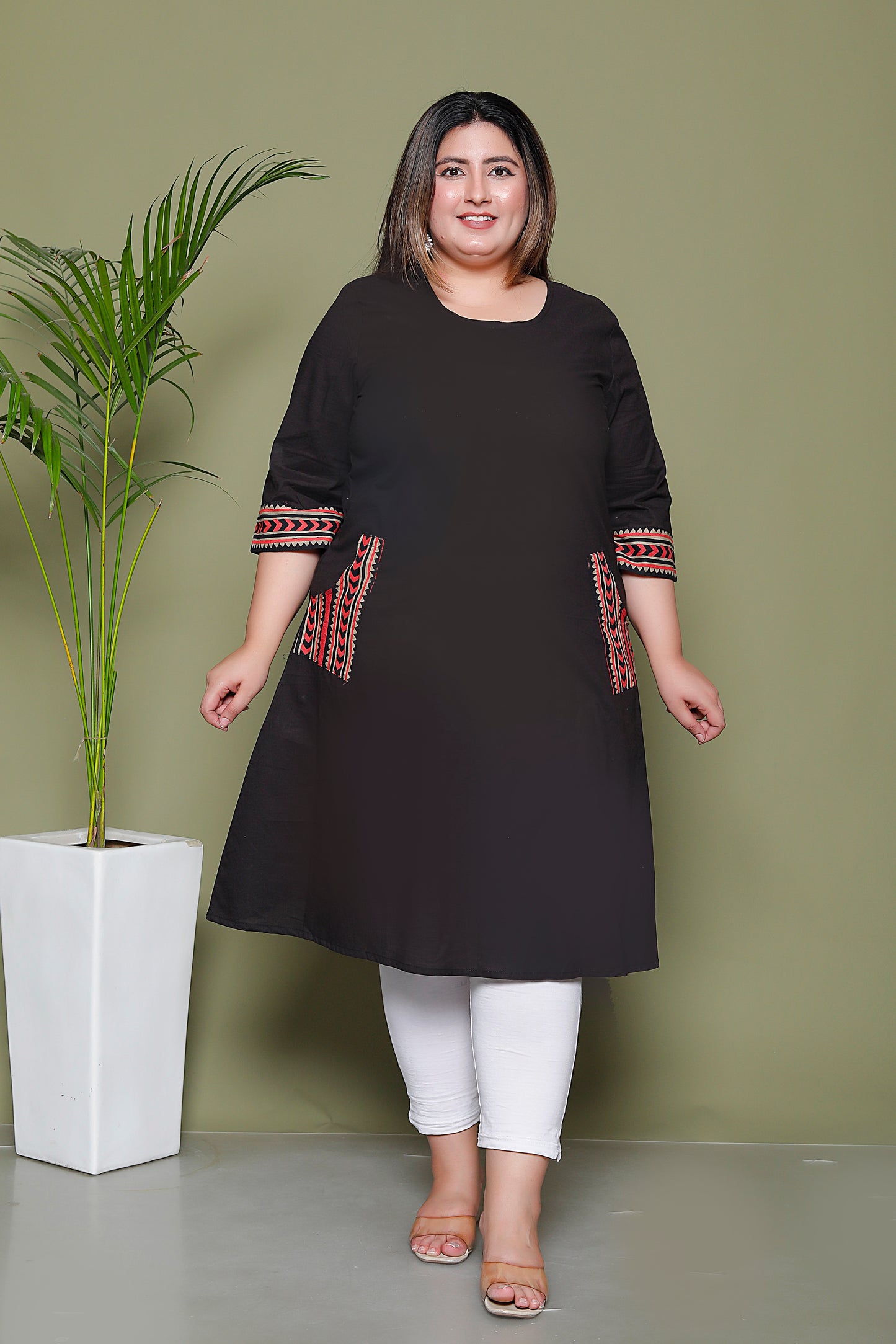 SOLID POCKET PRINT COTTON KURTI IN BLACK BY PLUSSIZEKURTI